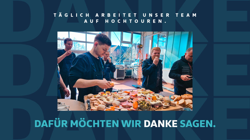 Mitarbeiter von Autohaus Socke essen begelgte Brötchen